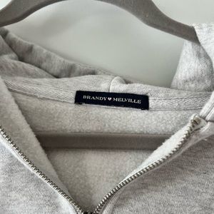 Light gray Brandy Melville one size zip up hoodie.